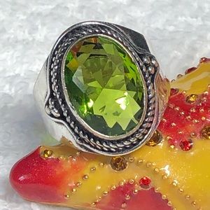 Silver peridot ring -unstamped -artisan/handmade
